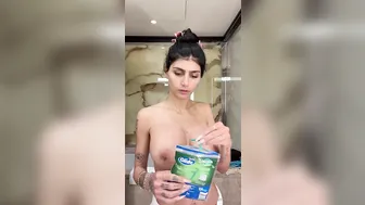 Mia Khalifa, Teasing Large Breasts in Hotel Shower