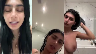 Leaked Clip Featuring Mia Khalifa in After Shower Red Dress Try On PPV