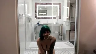 Miss Mao, Tattooed Tomboy Fucking a Wall Dildo in the Bathroom