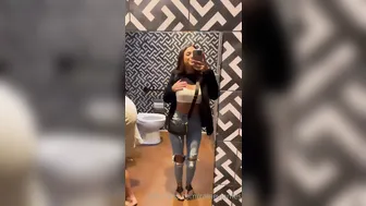 Rainey James, Teasing Her Naked Tits In The Public Toilet Until They’re Hard